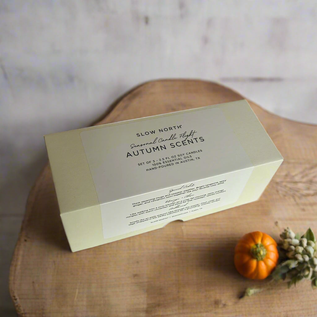 Box of Slow North Autumn Scents candles on a white background