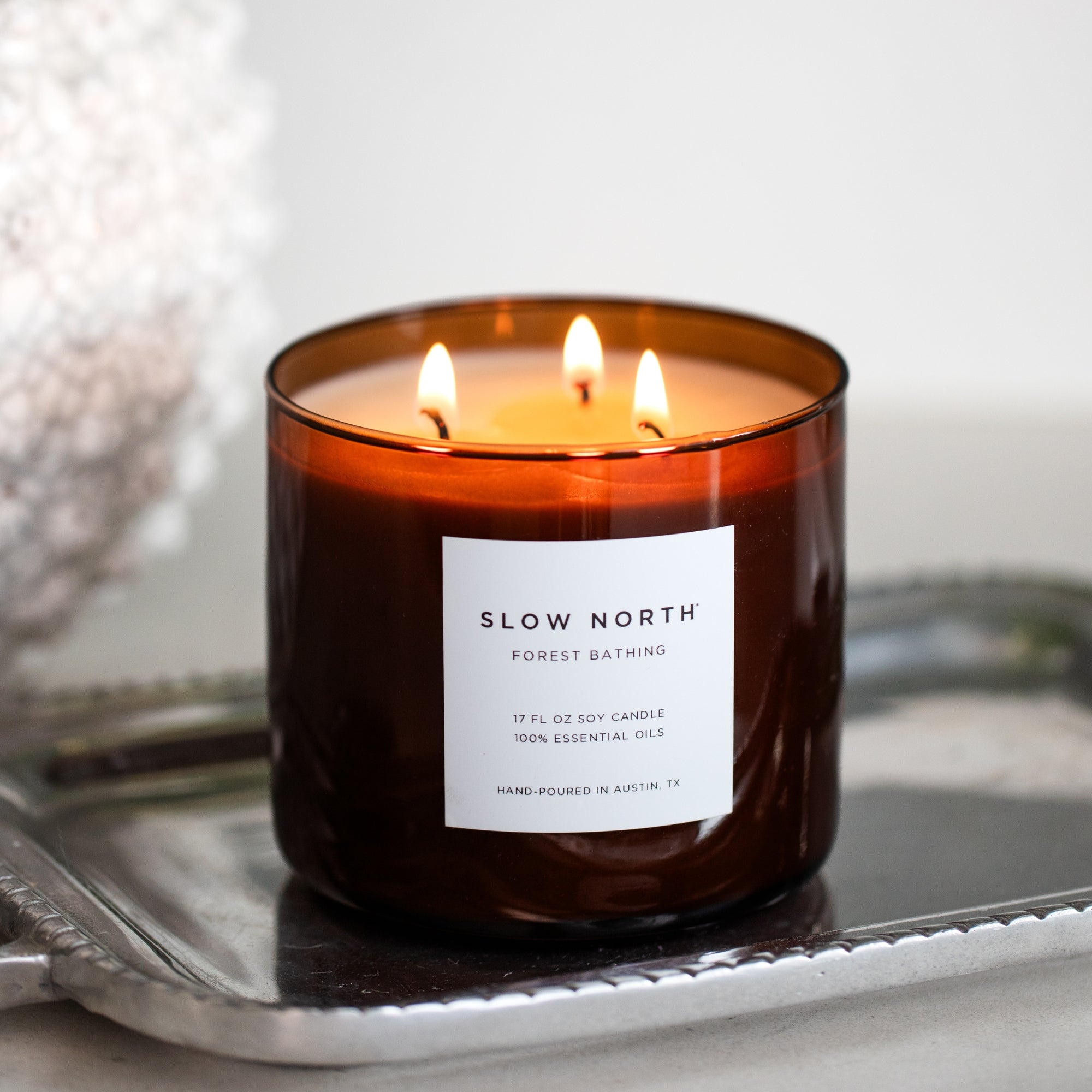 3-Wick Non-Toxic Candle with 'Slow North' label on a metallic tray