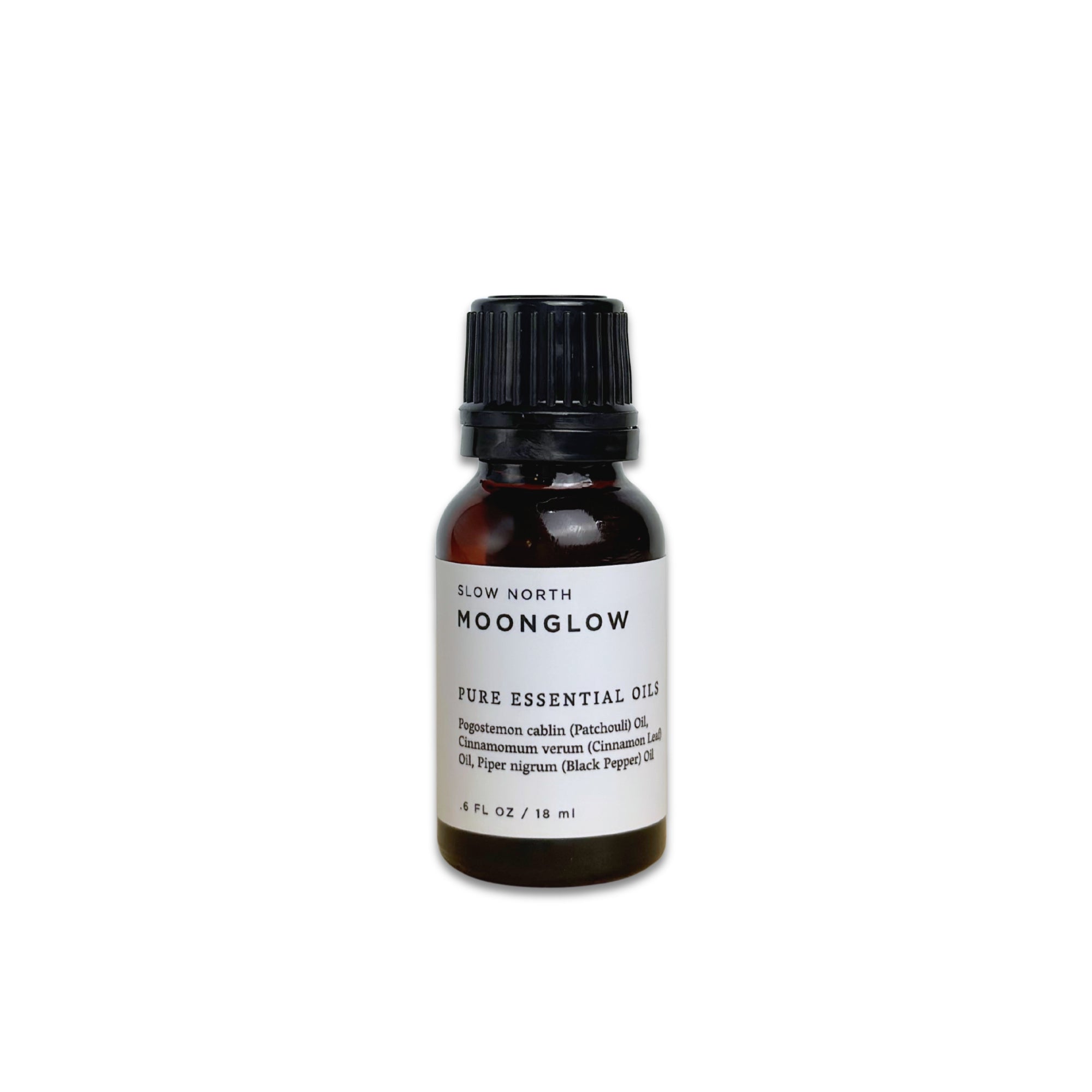 Bottle of Moonglow pure essential oils on a white background