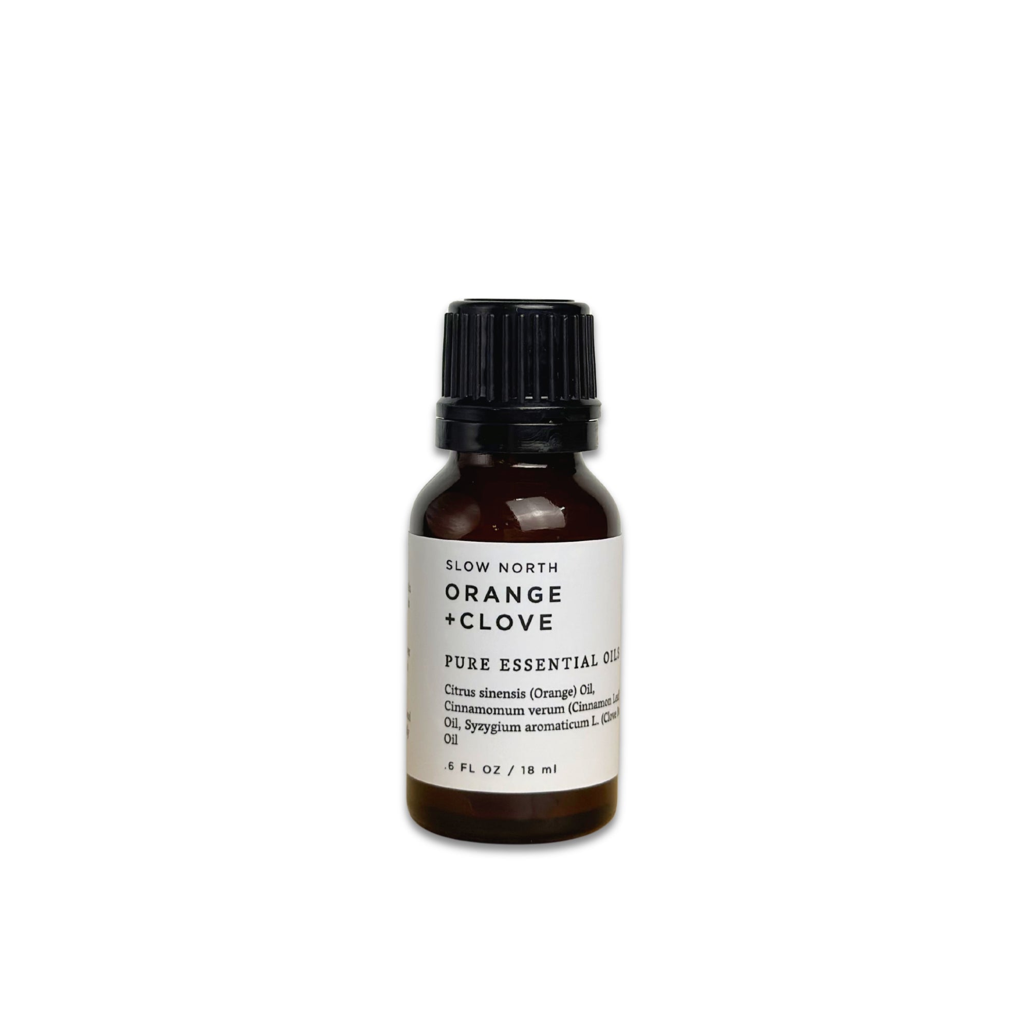 Bottle of Slow North Orange Clove pure essential oil on a white background