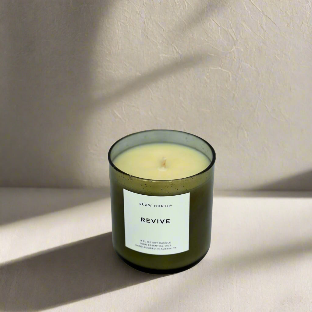 Green candle with essential oils