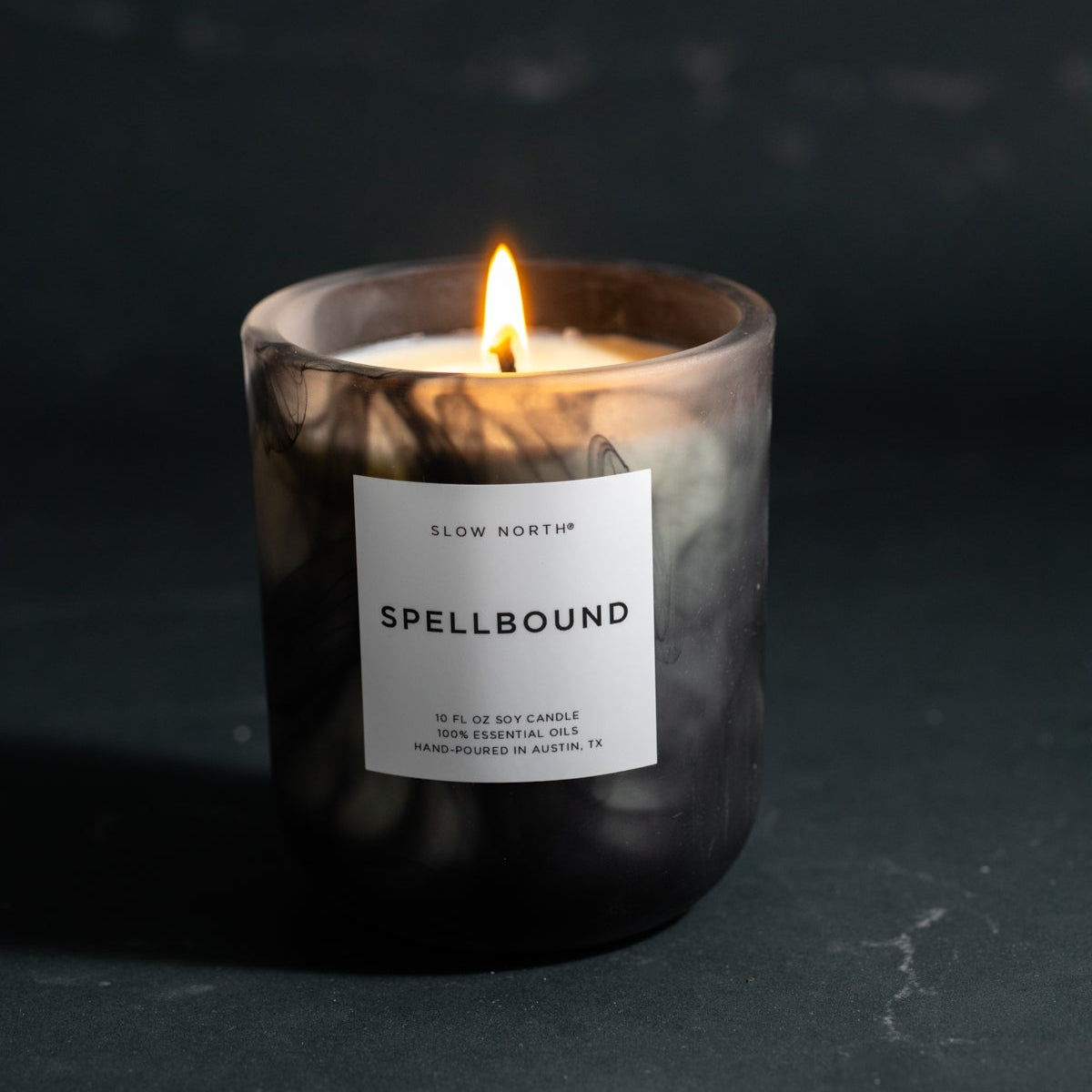 Candle labeled 'Spellbound' with a dark background