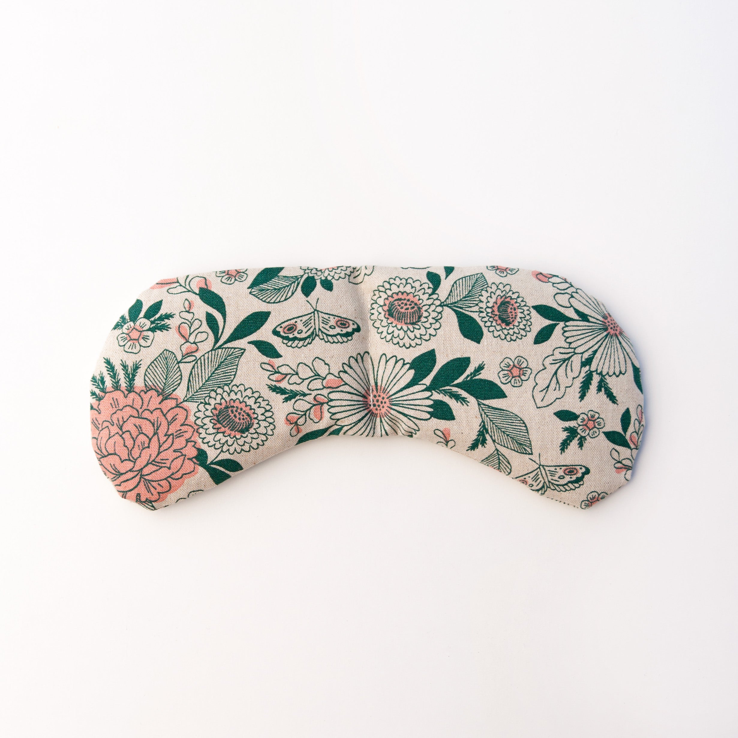 Pink and green floral pattern on cream fabric.