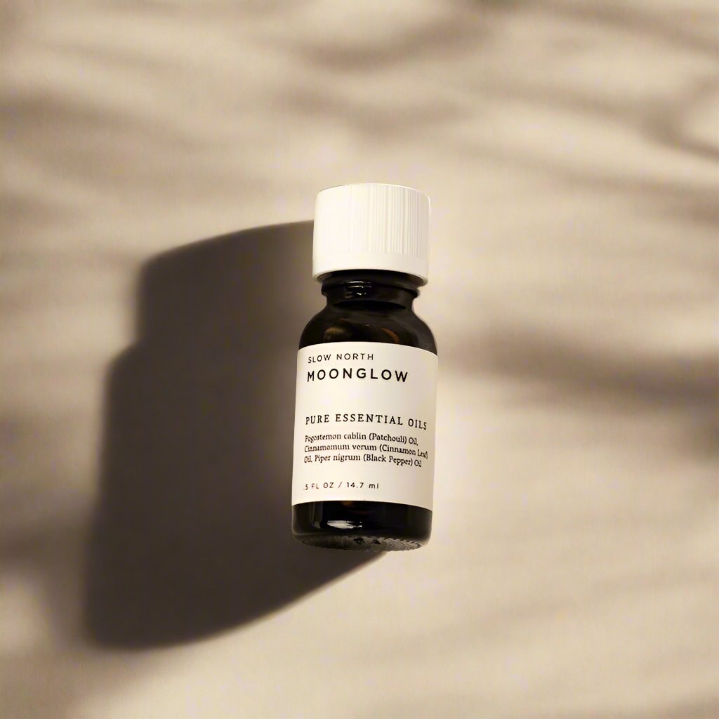 Moonglow 100% pure essential oil blend from Slow North in an amber bottle.