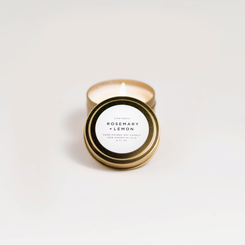 Rosemary + Lemon soy wax candle in 6 ounce gold travel tin by Slow North