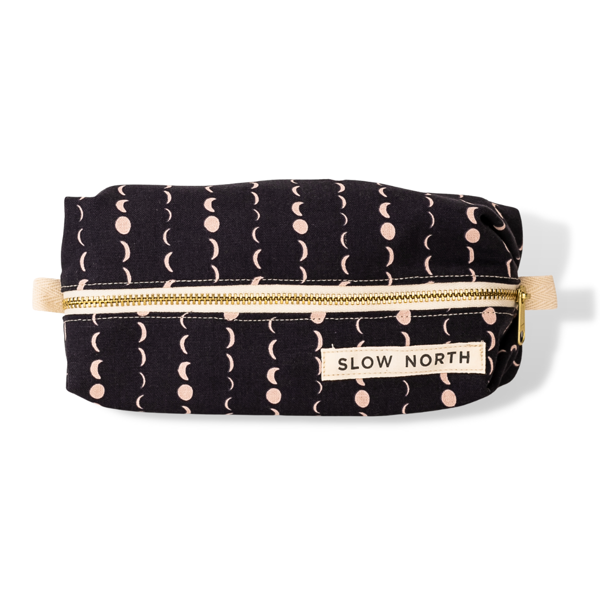 Light pink moon phase patterns on dark blue fabric.