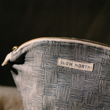 close up of slow north gold zipper bag