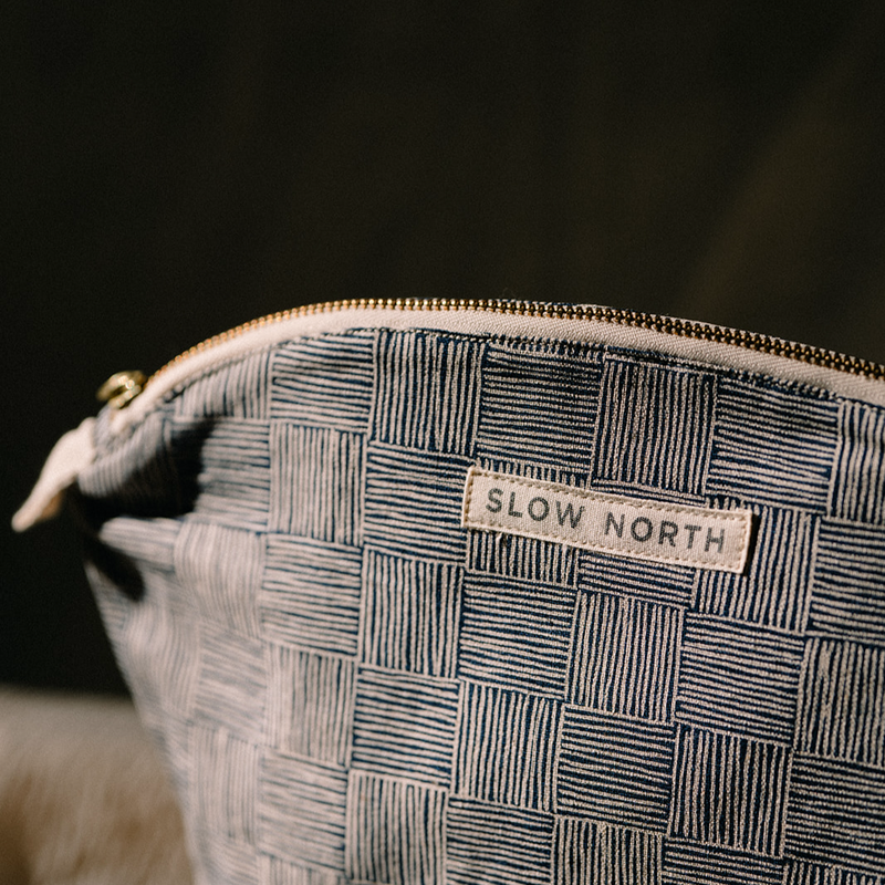 close up of slow north gold zipper bag