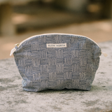 black and white handcrafted gold zipper cosmetic bag