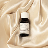 Moonglow 100% pure essential oil blend from Slow North in an amber bottle.