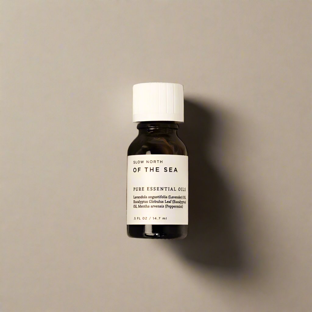 Of the Sea 100% pure essential oil blend from Slow North in an amber bottle.